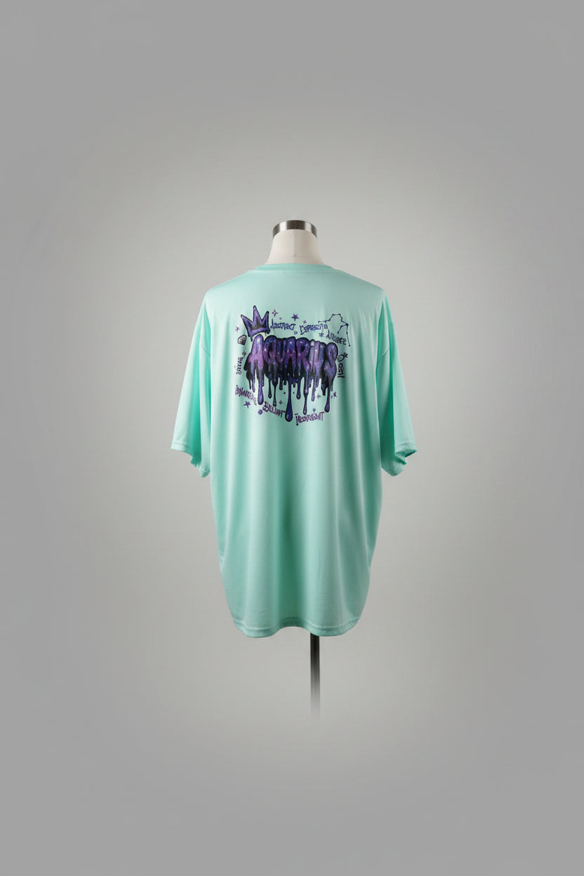 Light blue t-shirt with purple graphic design on a hanger against a white door.